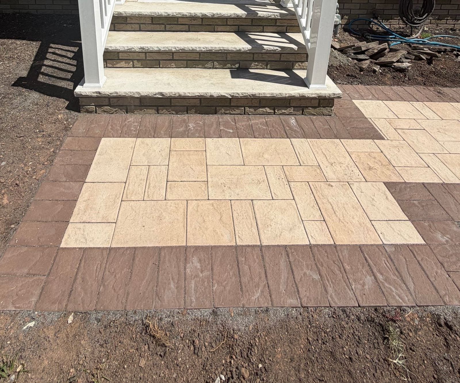 After: the finished approach meeting the entry steps, border course returning square against the risers